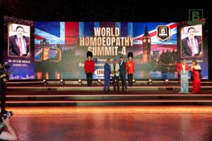Award ceremony at World Homoeopathy Summit 4 in London with participants on stage